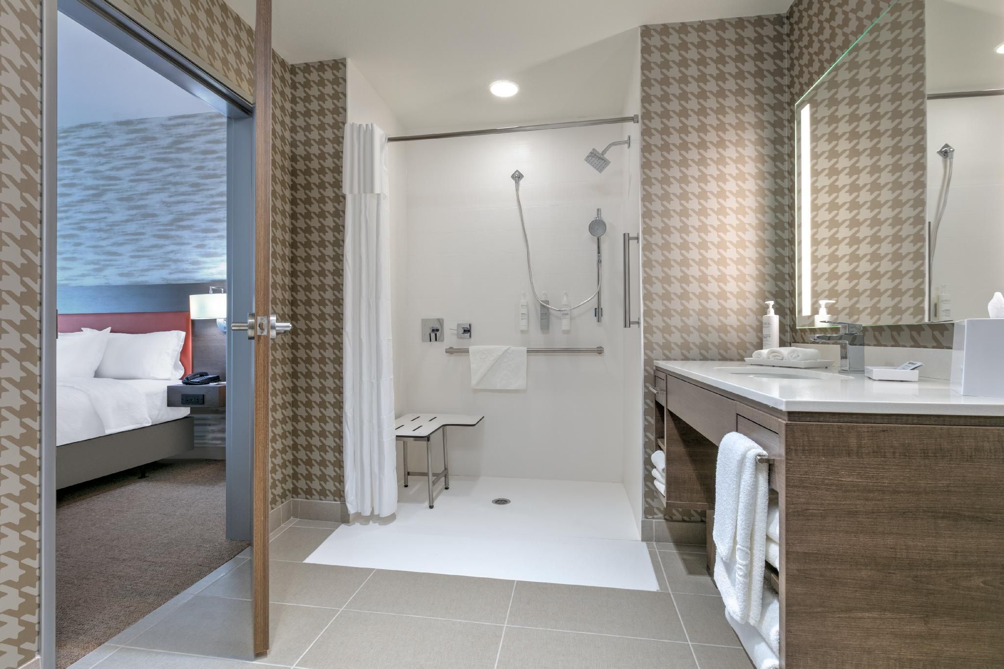 1 King Accessible Roll In Shower Suite