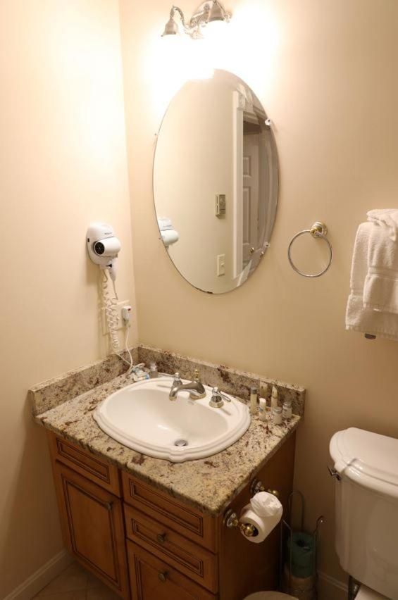 Two-Bedroom Suite with Kitchen, Balcony, and Partial Ocean View  2A
