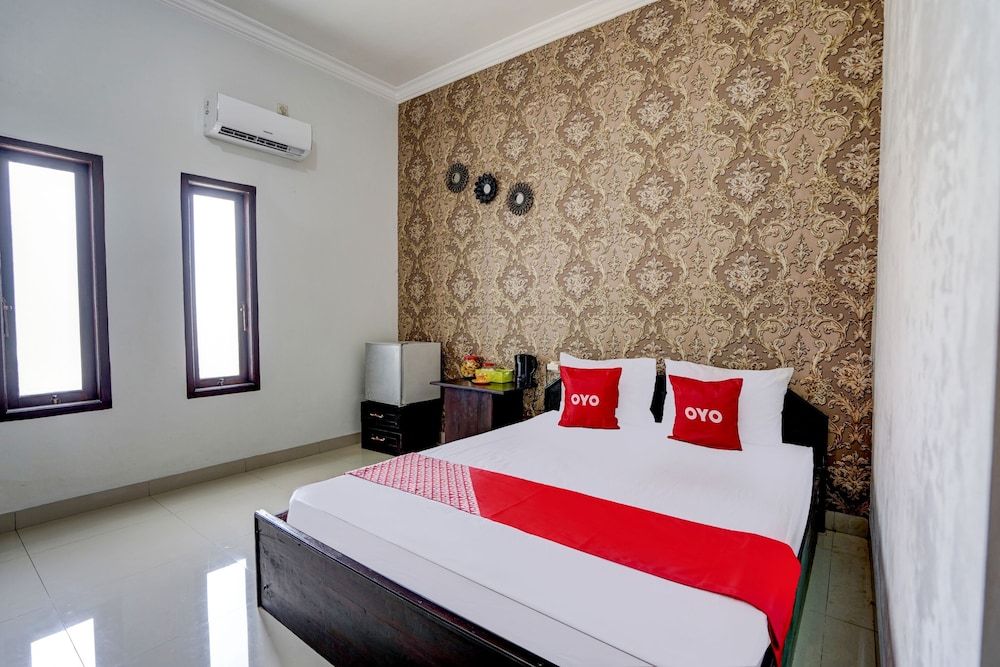 OYO 92907 Miranda Hotel Syariah Standard Double Room 12