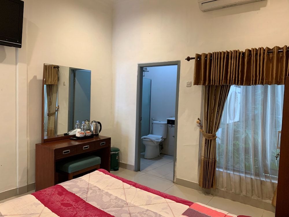 Sinergi Hotel Tretes Deluxe Room 4