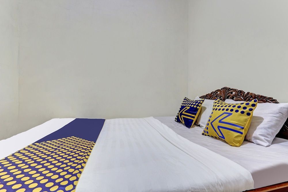 SPOT ON 90744  Alika Homestay Economy Double Room 4