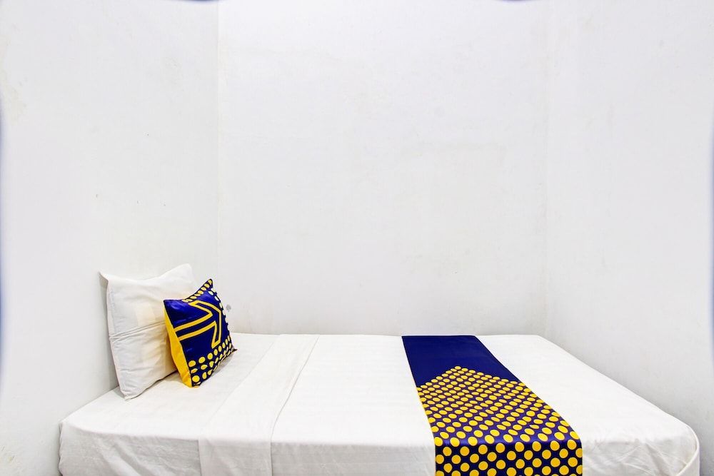 SPOT ON 93527 Agus Kostel SyariahNearWisata Agro Jollong Single Room 2