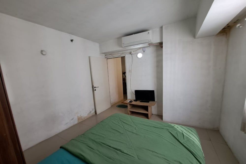OYO Life 93106 Apartement Grand Sentraland By Andi Deluxe Double Room 19