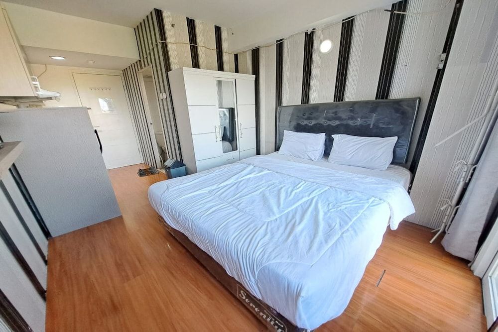 OYO Life 93106 Apartement Grand Sentraland By Andi Deluxe Double Room 12