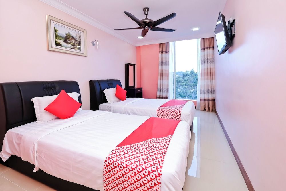 OYO 714 Arina Hotel Deluxe Twin Room 3