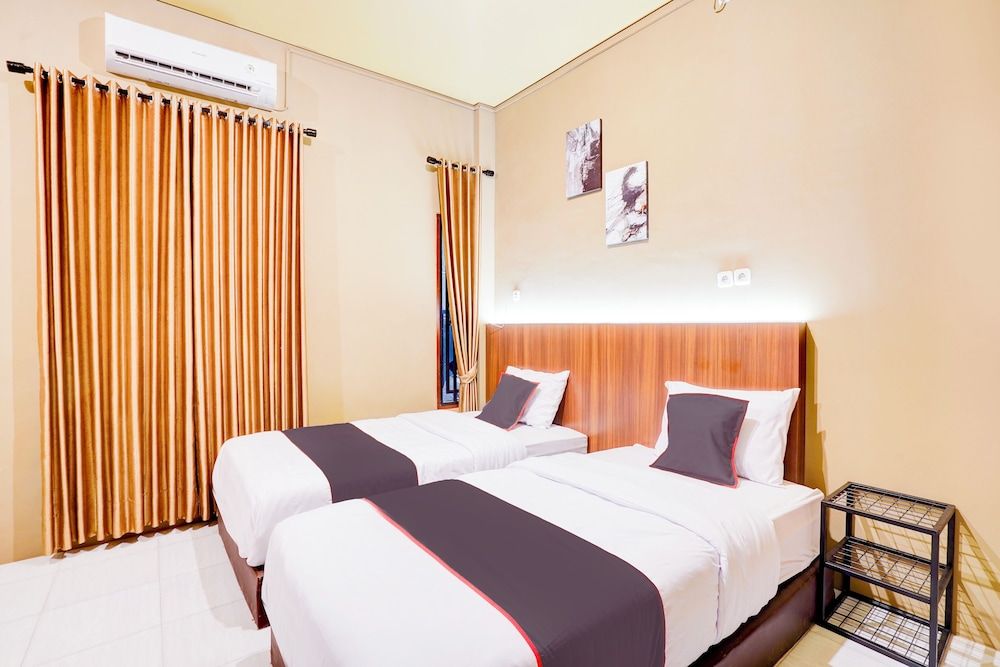 Collection O Padang City Center Near Transmart Padang Formerly De Orchids Deluxe Twin Room 4