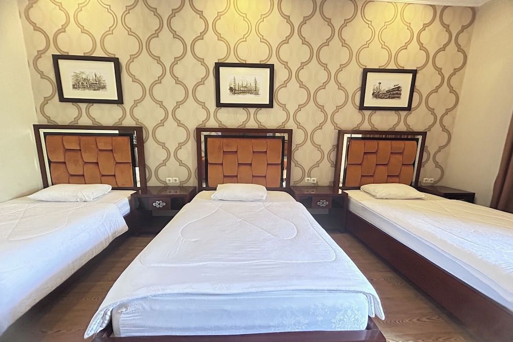 Niwa Canting By Zuzu Triple Room with Balcony 3