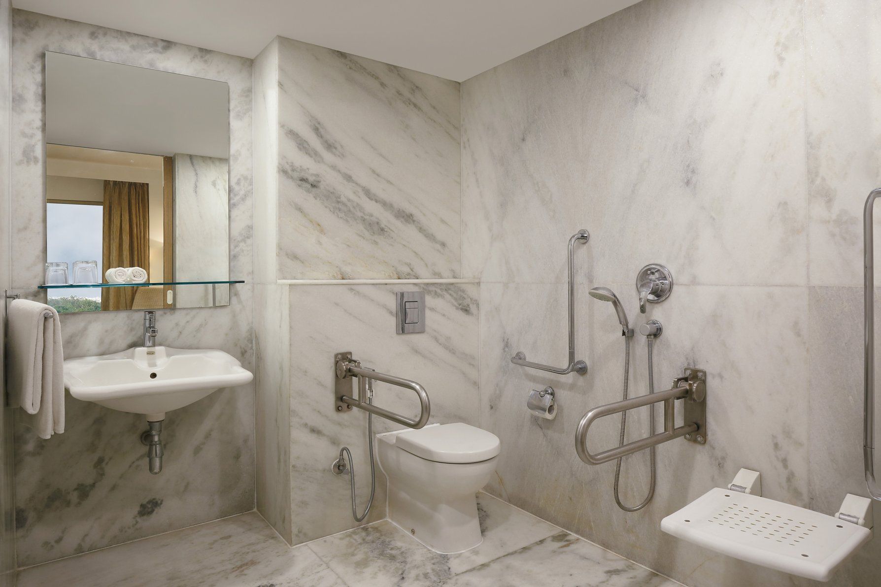 Deluxe Guest Room Accessible Bathroom – Roll-In Sh