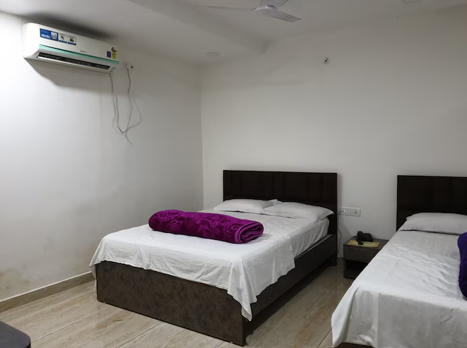 HOTEL SATYAM JAIGAON Triple Deluxe Room NON AC 2
