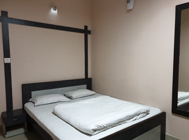 HOTEL SATYAM JAIGAON Double Deluxe Bed Room NON AC 2