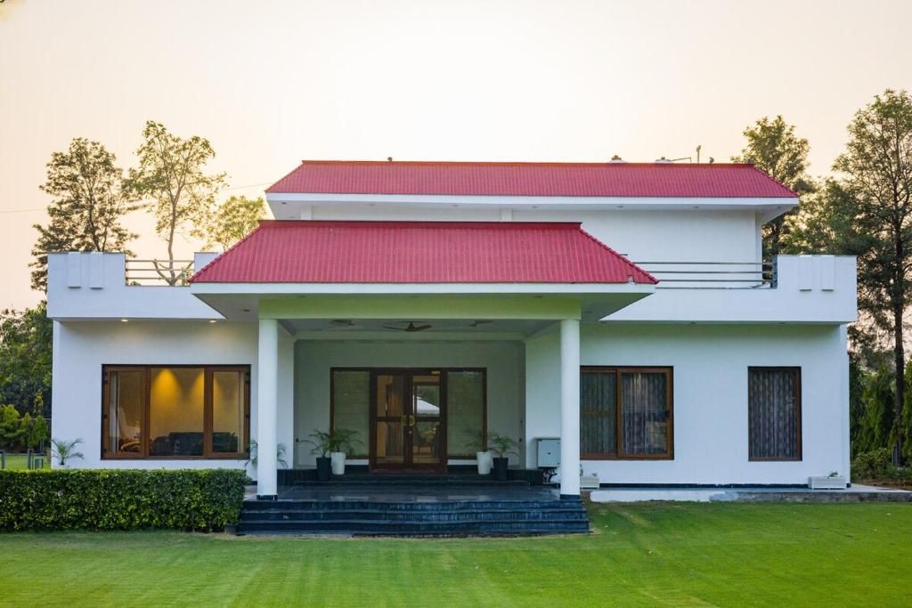 ELIVAAS Sanisa Farm 3-BHK Farmhouse with Pvt Pool, Game Zone & Lush Garden