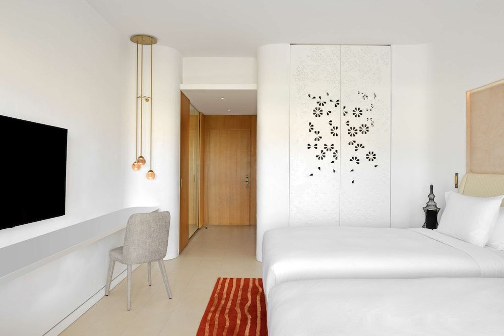 Twin bed Partial ocean view