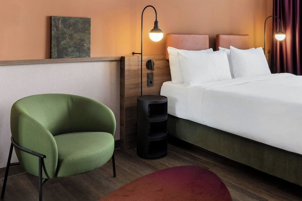 June Six Salzburg, a Tribute Portfolio Hotel Superior Room, 1 King Bed, Courtyard View 2