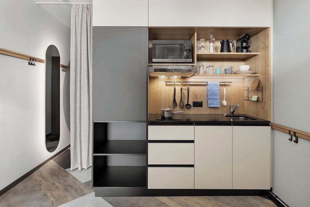 Stay KooooK Geneva City – Online Check In Studio 5