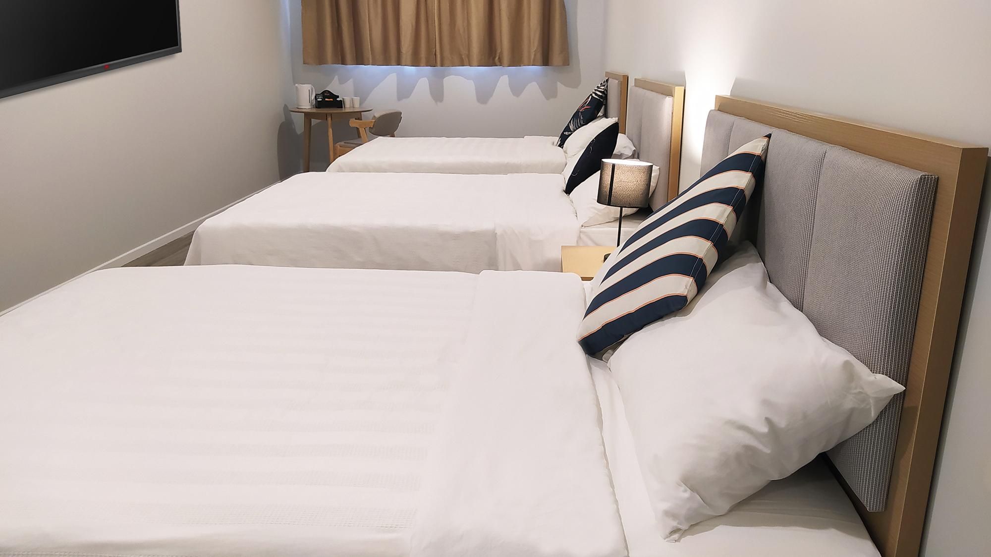 Grand Triple Room