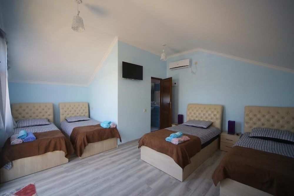 Hotel Balcony Comfort Quadruple Room