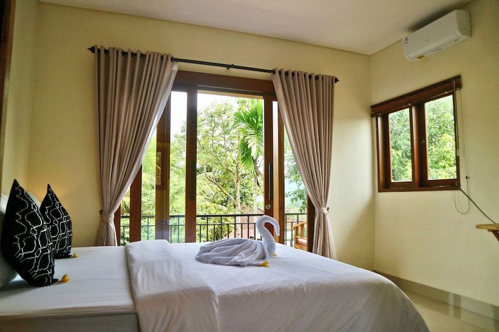 Gria Sindhu Homestay Sidemen Deluxe Room, Garden View 4