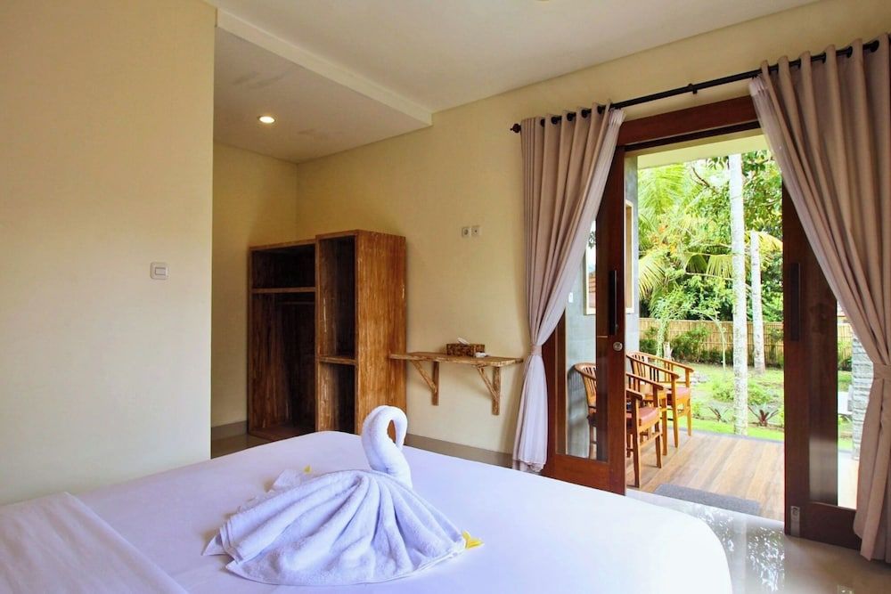 Gria Sindhu Homestay Sidemen Deluxe Room, Garden View 5