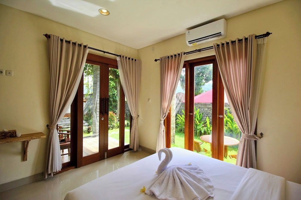 Gria Sindhu Homestay Sidemen Deluxe Room, Garden View 7