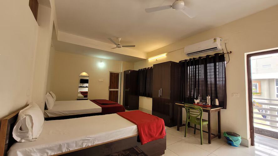 Triple Ac Deluxe Room with Balcony