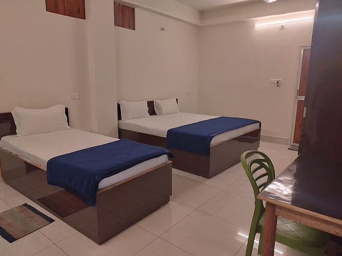 Triple Ac Deluxe Room with Balcony