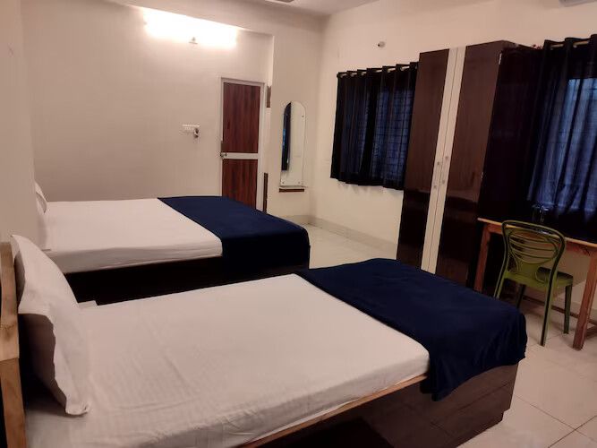 Triple Ac Deluxe Room with Balcony