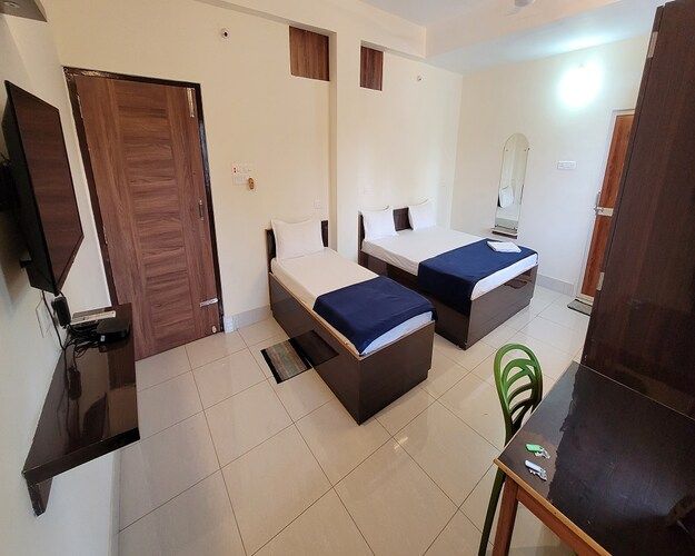 Triple Ac Deluxe Room with Balcony