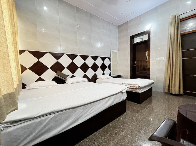 Deluxe Triple Bed Room with Balcony