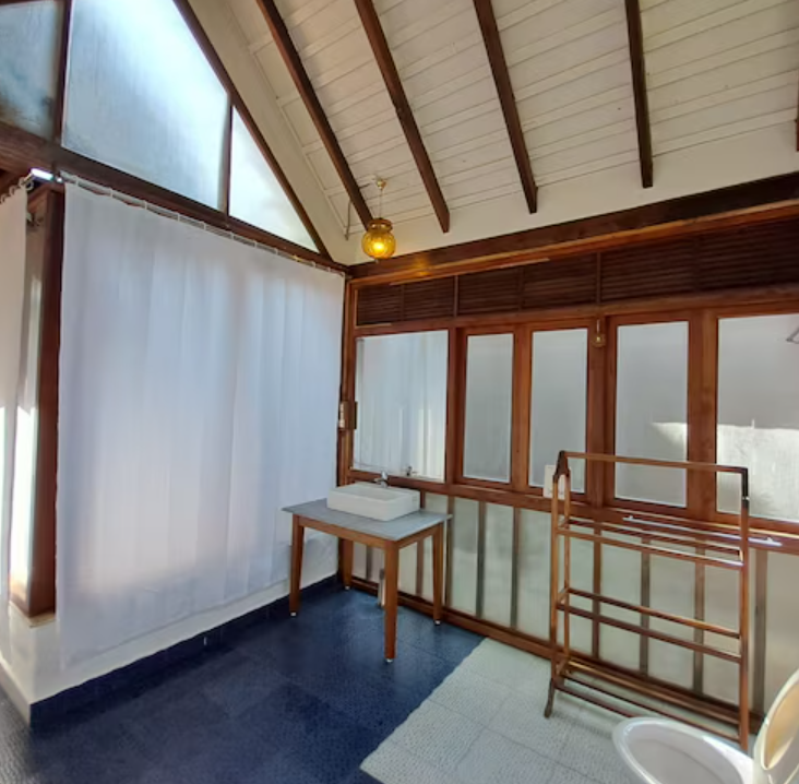 Non Smoking Balinese style poolside Wooden Chalet