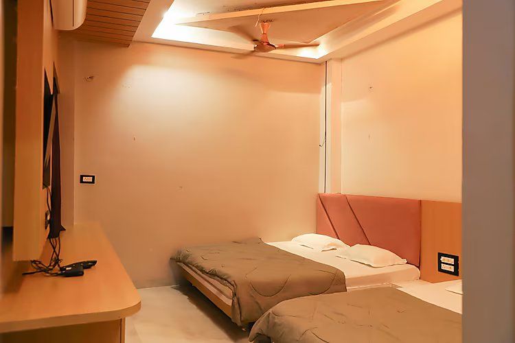 Three Bedded AC Room