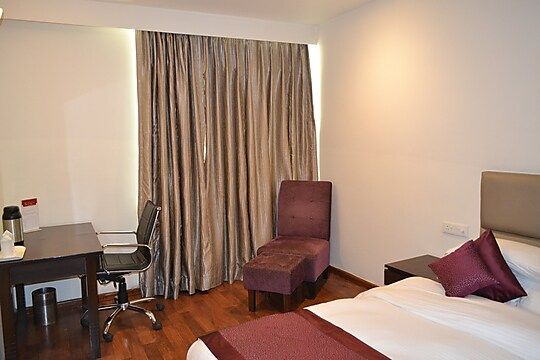 Hotel Sobti Continental Club Room with Living Area and Work Desk 3