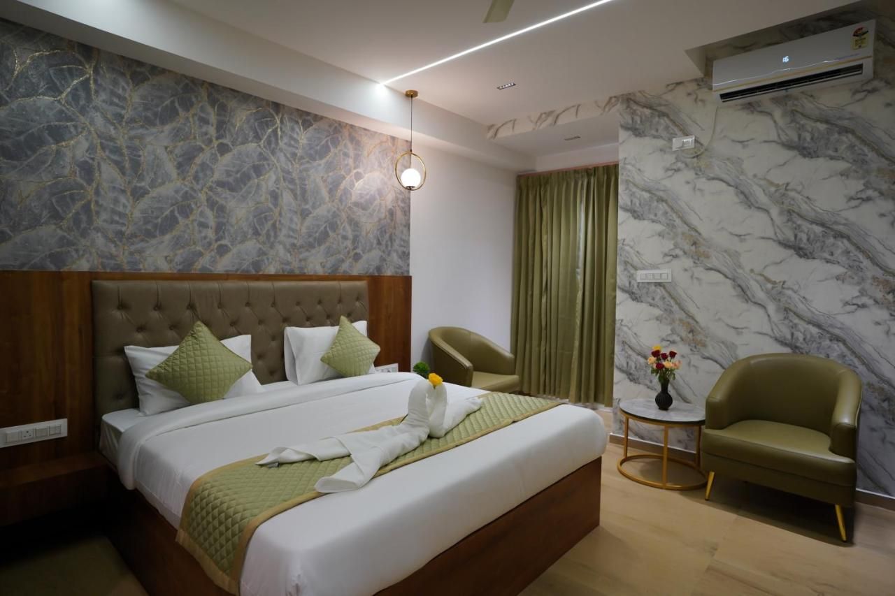 Visthara a unit of Suraksha Stay Superior King Room with balcony 6