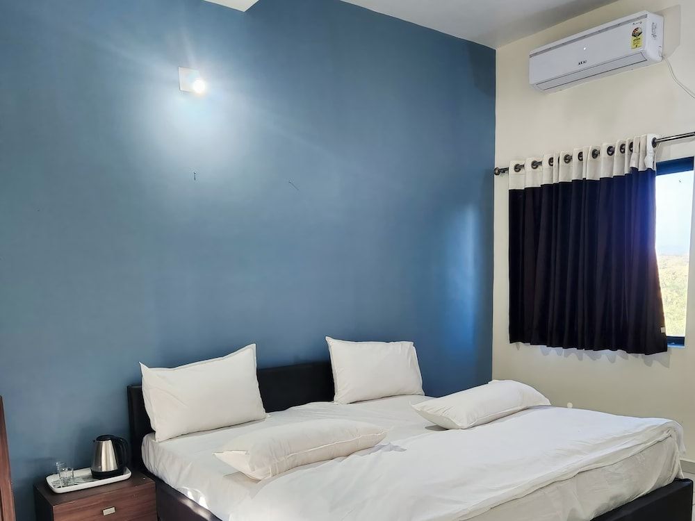 Vanbhoomi Resort Deluxe Room