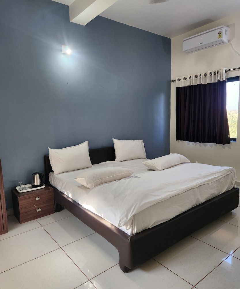 Vanbhoomi Resort Deluxe Room 3