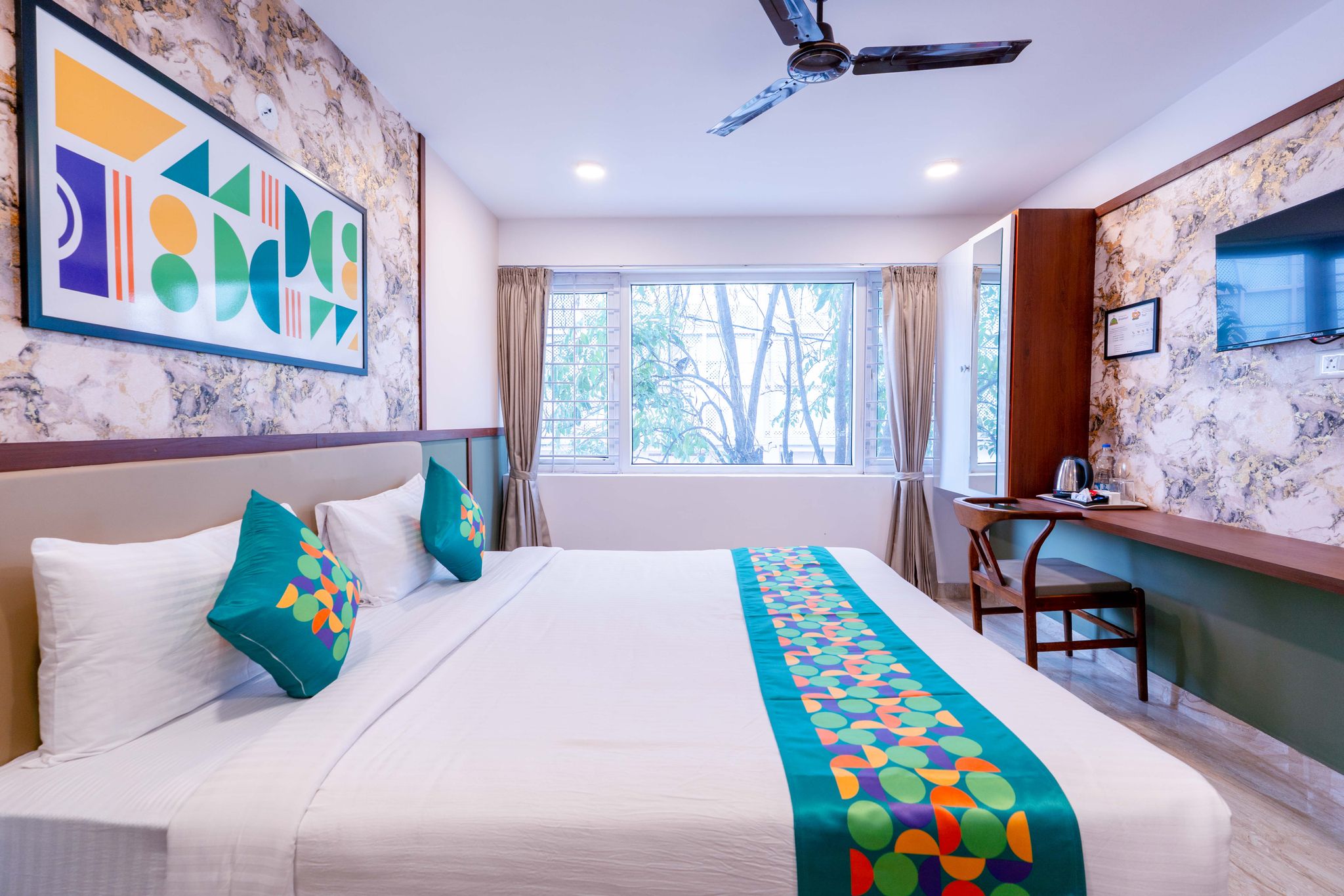 Treebo Emirates Suites Indiranagar Standard room 5