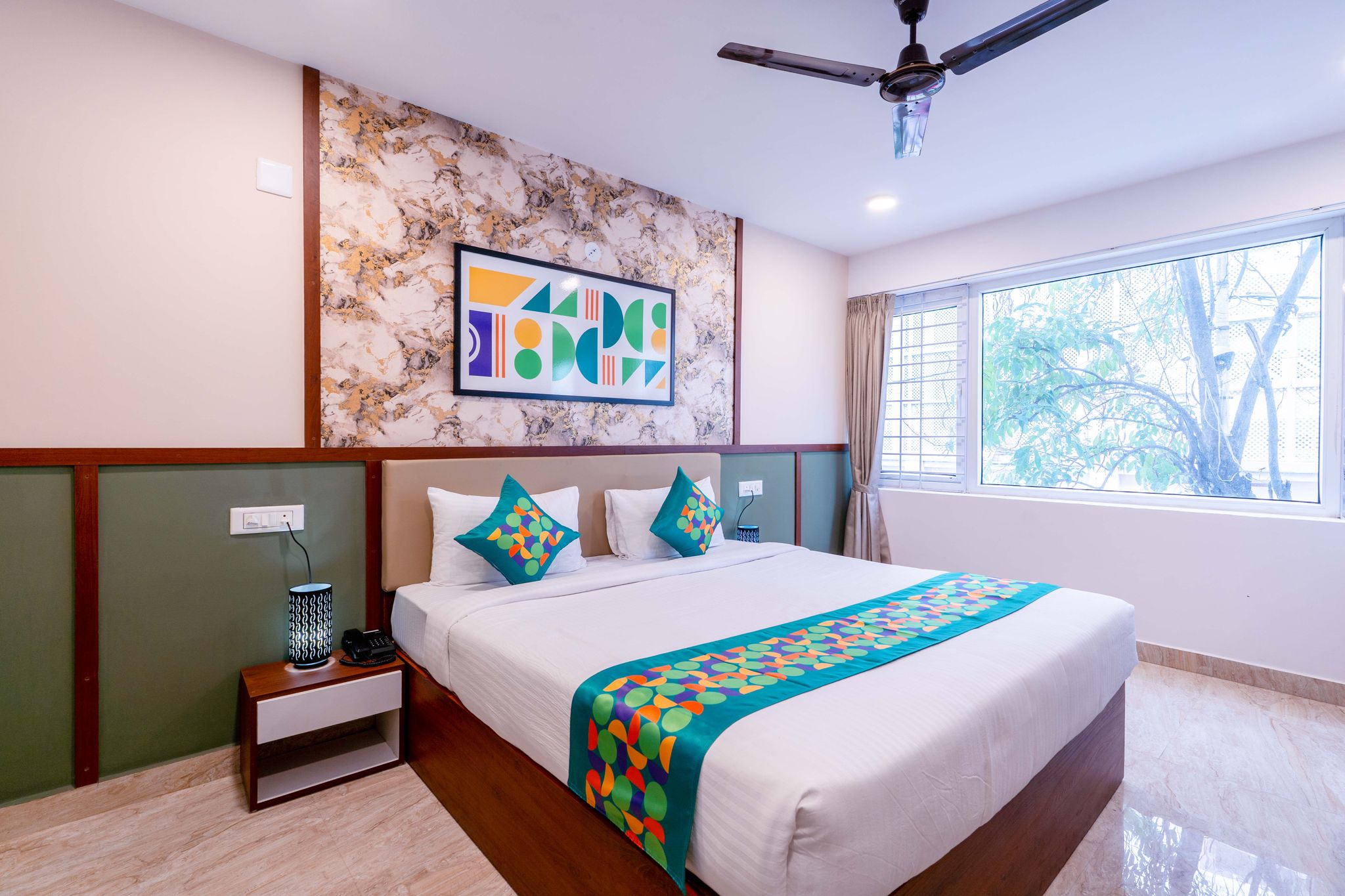 Treebo Emirates Suites Indiranagar Standard room 3