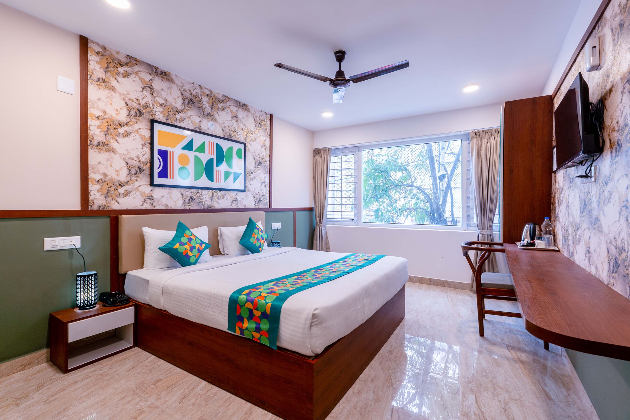 Treebo Emirates Suites Indiranagar Standard room 8