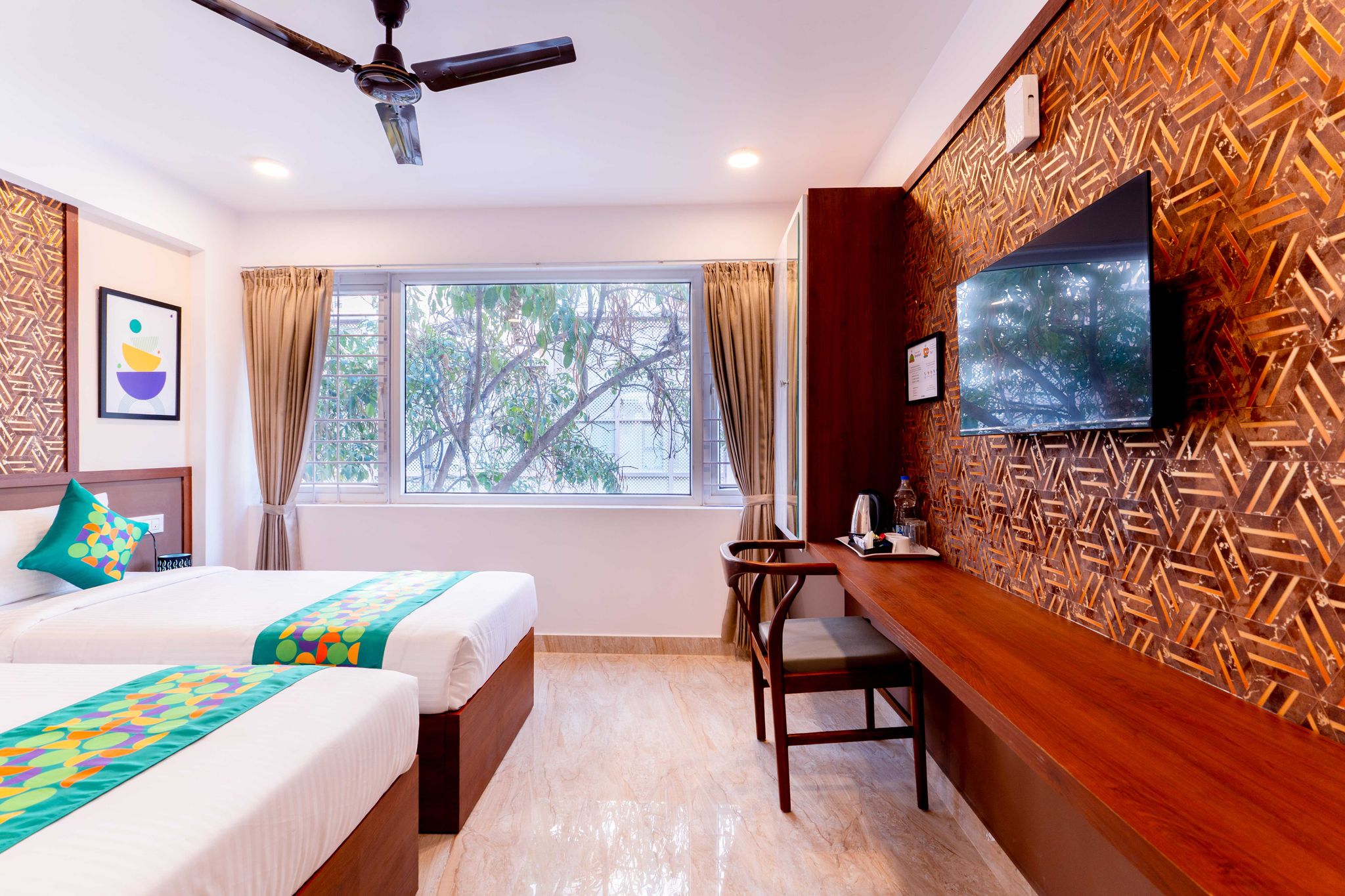 Treebo Emirates Suites Indiranagar Standard room 13