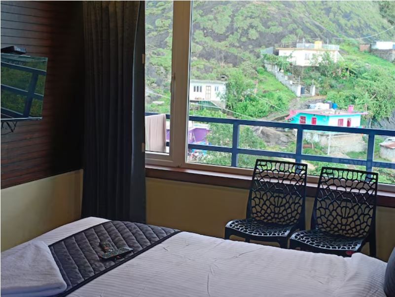 DELUXE ROOM WITH BALCONY VIEW