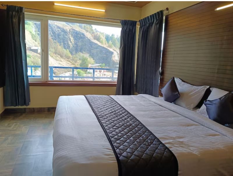 DELUXE ROOM WITH BALCONY VIEW