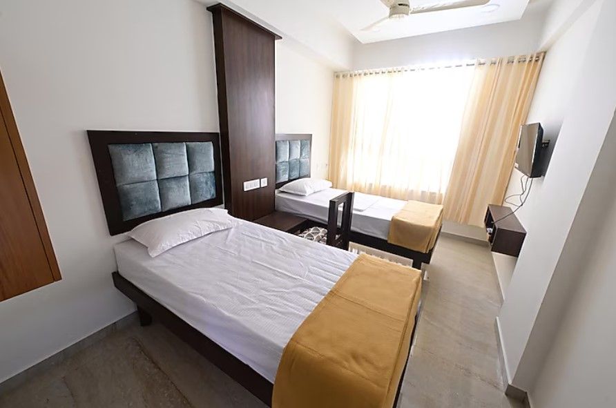 APEX RESIDENCY INN Standard Twin Bed Room with City View 3