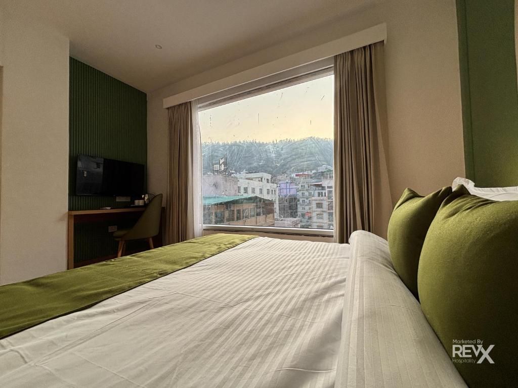 Premium Suite With Sofa Cum Bed