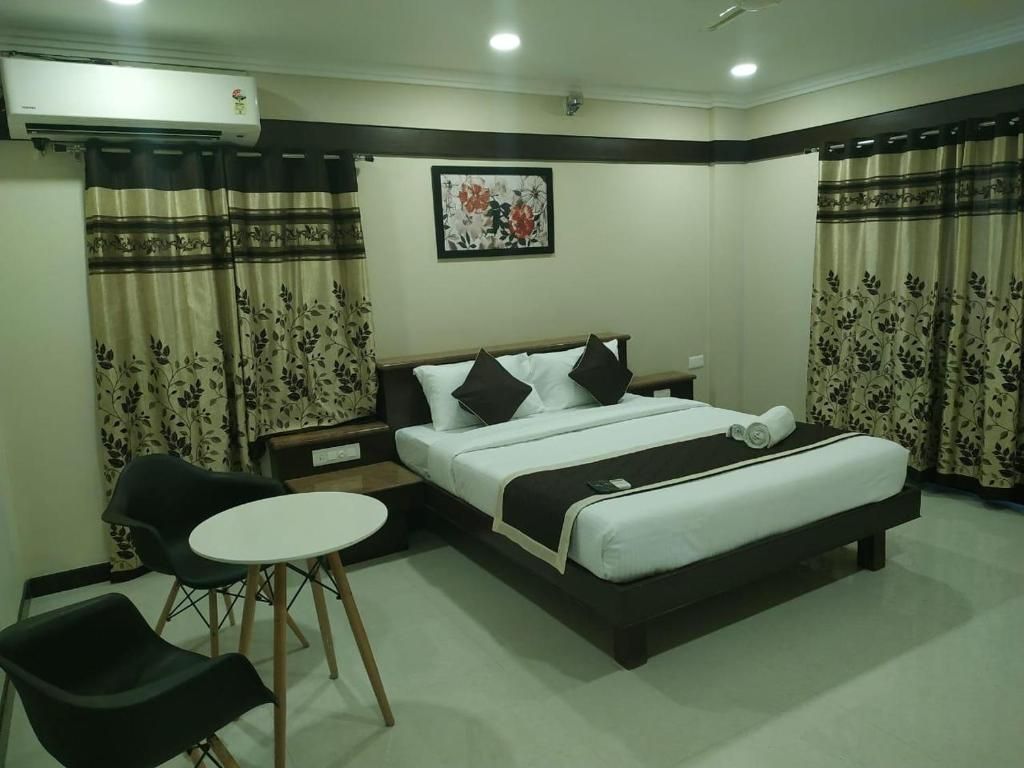 Hotel Rose Mansion Manyata Tech Park Deluxe Suite 10