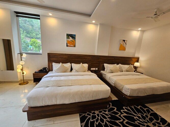 Family room with balcony and hill view