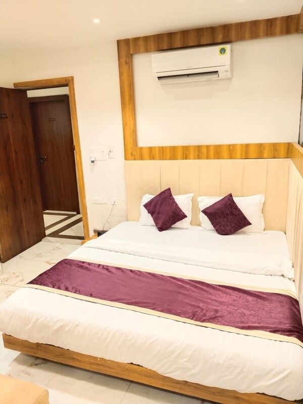 Purple Orchid Deluxe Room 5