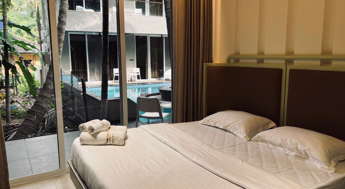 Waves By Jumbo Holidayz Double Room with Pool View 2