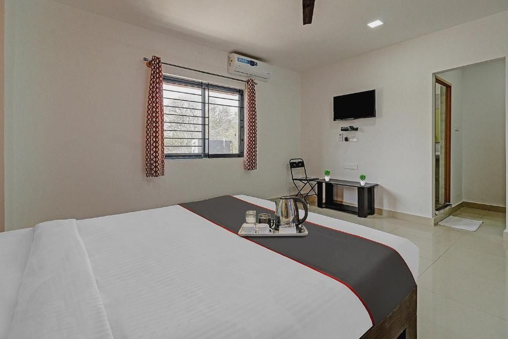 Blooms Stay Inn Near Snow City Deluxe Room 6