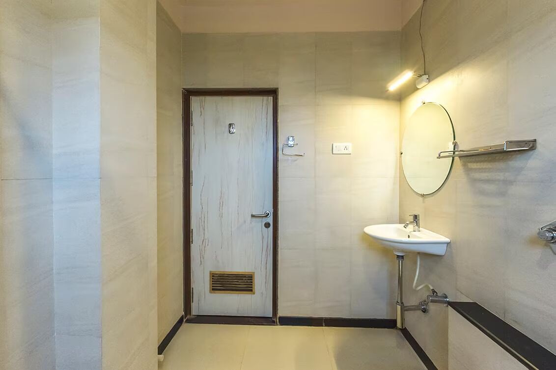 Hotel Pooja Garden AC Deluxe Double Bed 3