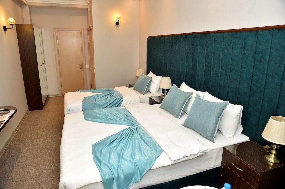 Karat Inn Boutique Hotel Family Room, Courtyard View