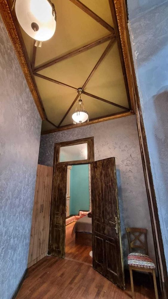 Apartments History 1870 Family Apartment, Courtyard View 3